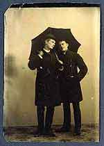 unidentified photographer, portrait of two men with umbrella, 1890